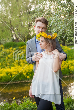 Young couple together outdoor. Romantic vacation 64442172