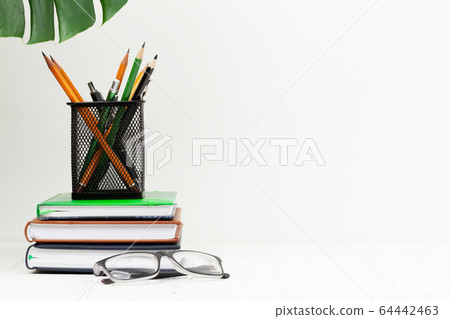 Office desk workspace table with supplies and Office desk workspace table with supplies and 64442463