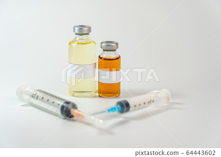 Vaccine bottle with blank label on white background 64443602