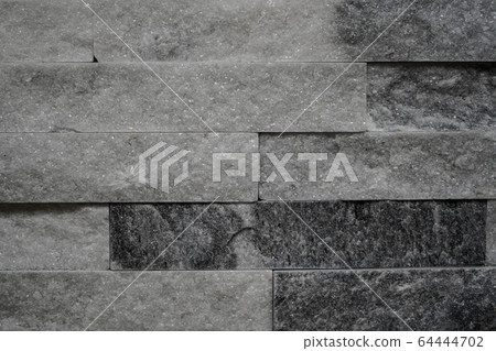 grey smoky wall coverings in the form of natural stone for facing, landscape, interior. 64444702