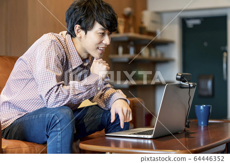 Image of video chat telework using a webcam Image of video chat telework using a webcam 64446352