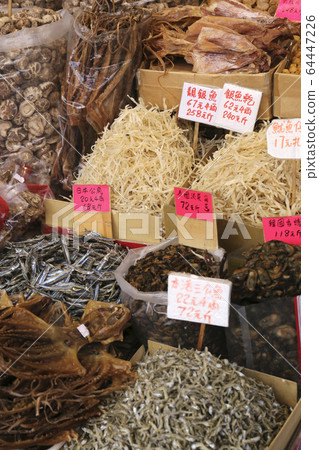 Sea cucumbers and scallops that were dried and sold at a dry food store west of Tokusuke Road, Hong Kong. 64447226