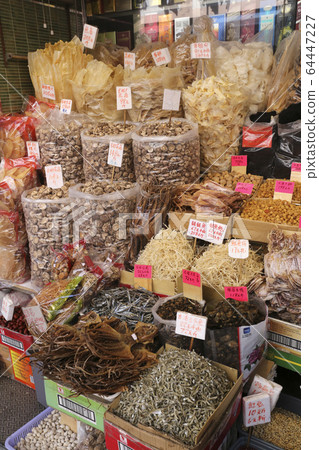Sea cucumber (foreground) and scallops sold at a dry store in Tokusuke-do, Hong Kong. 64447227