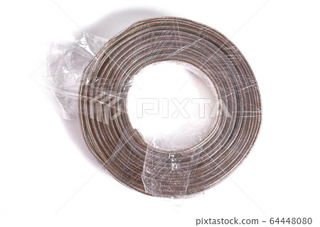 Audio cable lies on a white background 64448080