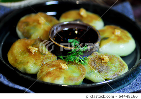 bun , Thai bun or vegetable stuffed bun 64449160
