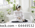 Woman ironing 64449532