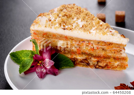 Fresh delicious carrot cake with cream Fresh delicious carrot cake with cream 64450208