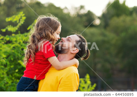 Happy family for a walk Happy family for a walk 64450895