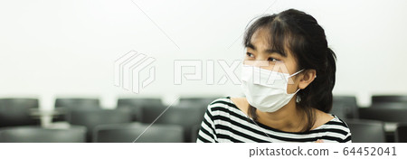 close up face asian young woman wearing medical mask for prevent dust and infection covid-19., 64452041