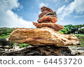 Sort the rocks on Koh Samet beach 64453720
