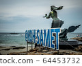Mermaid statues and child on Koh Samet 64453732