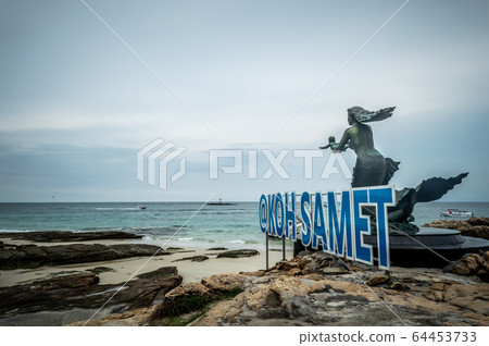 Mermaid statues and child on Koh Samet Mermaid statues and child on Koh Samet 64453733