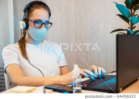 Woman in quarantine for coronavirus working from home Woman in quarantine for coronavirus working from home 64456033