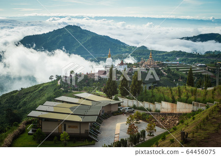 Top view to see mountain and Wat Pha Sorn Kaew Temple or Wat Phra Thart Pha Kaew Temple in Khao Kho, Thailand. view of mountain, blue sky and cloudy. Top view to see mountain and Wat Pha Sorn Kaew Temple or Wat Phra Thart Pha Kaew Temple in Khao Kho, Thailand. view of mountain, blue sky and cloudy. 64456075