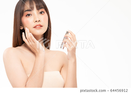 Beauty asian woman brown hair looking smile in camera happiness and hold bottle cosmetic cream lotion and cheerful with make up brush,Beauty Concept on white background. Beauty asian woman brown hair looking smile in camera happiness and hold bottle cosmetic cream lotion and cheerful with make up brush,Beauty Concept on white background. 64456912