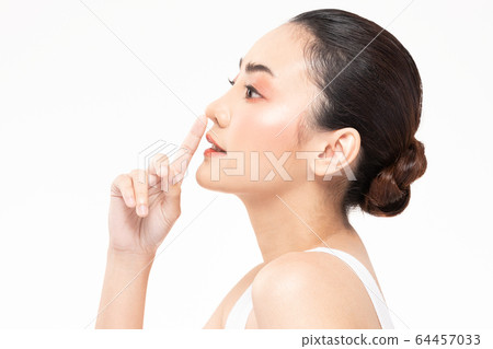 Beauty asian women touching nose portrait face with natural skin and skin care healthy hair and skin close up face beauty portrait.Beauty Concept on white background. Beauty asian women touching nose portrait face with natural skin and skin care healthy hair and skin close up face beauty portrait.Beauty Concept on white background. 64457033
