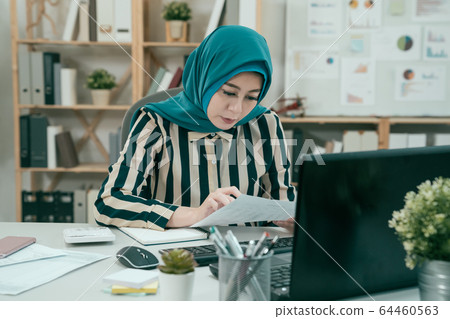 Young beautiful arabic woman wearing traditional 64460563