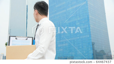 Asian man being fired 64467437