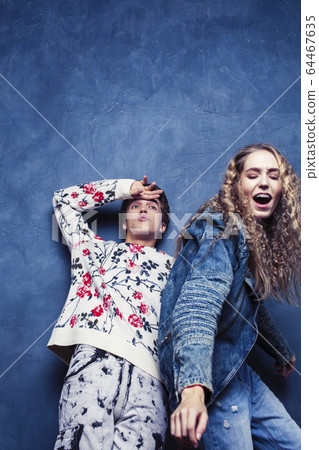 young pretty boy and girl friends happy smiling together in interior, lifestyle people concept 64467635
