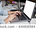 Close up creative freelancer hand using laptop for new project or student study e-learning 64468984