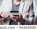 Men use smartphone/ mobile searching browsing internet data information networking concept 64468986