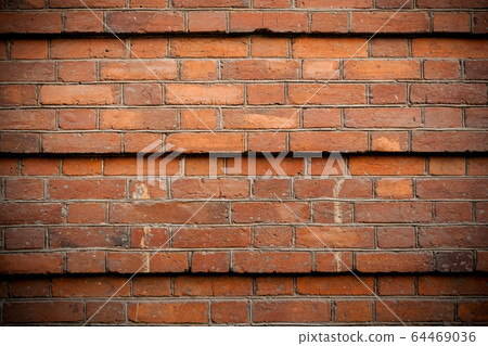 Part of old brick wall lined with steps across five rows of brickwork. Stone brick wall backdrop. Part of old brick wall lined with steps across five rows of brickwork. Stone brick wall backdrop. 64469036
