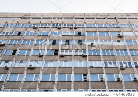 Part of wall of old concrete building with open Part of wall of old concrete building with open 64469038