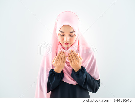 portrait of asian Muslim young woman wearing business attire and hijab with mixed poses and gestures 64469546