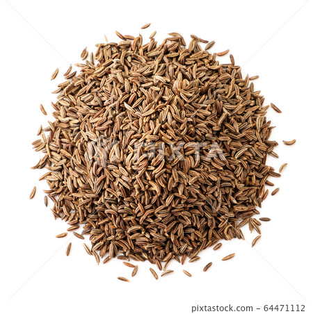 Pile of ccumin seeds on a white isolated. The view Pile of ccumin seeds on a white isolated. The view 64471112