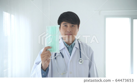 Medical concepts. The doctor is wearing a mask in Medical concepts. The doctor is wearing a mask in 64473653