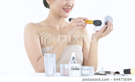 Beauty concept. A beautiful woman makeup on a Beauty concept. A beautiful woman makeup on a 64473694