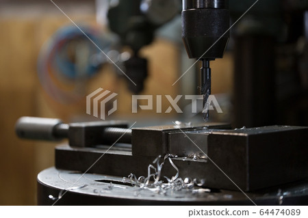 Drilling with a drill machine 64474089