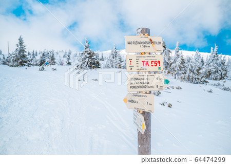 Tourist Signpost Ruzova Hora near the top of the Highest Mountain - Snezka, Krkonose, Czech Republic 64474299