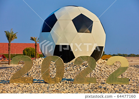 giant soccer football sculpture soccer world cup Qatar 64477160