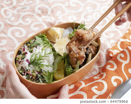 women eating bento box set Stock Photo by anankkml