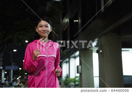 Walking jogging running woman 64480098