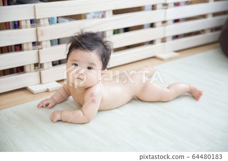 A naked baby A naked baby 64480183