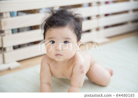 A naked baby A naked baby 64480185