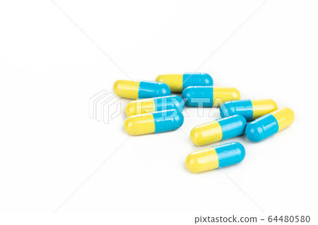Close-up of group of medicine in capsule format on 64480580