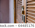 Closeup wooden door lock with copy space,Lock the door for security. 64485176
