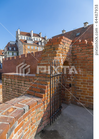 Fragment of a brick wall 64487938