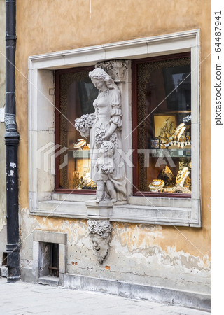 Sculpture on the window Sculpture on the window 64487941