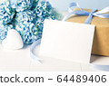 Close up of empty white greeting card  with brown 64489406