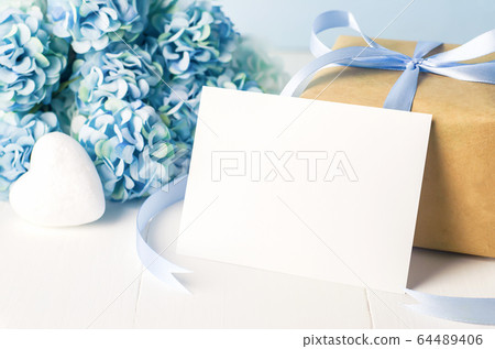 Close up of empty white greeting card with brown Close up of empty white greeting card with brown 64489406