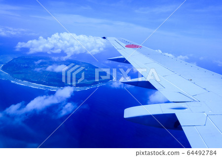 Sea and island as seen from an airplane Sea and island as seen from an airplane 64492784