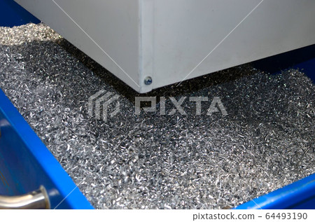 Steel scrap materials recycling. Abstract, background and texture of metal shavings Steel scrap materials recycling. Abstract, background and texture of metal shavings 64493190