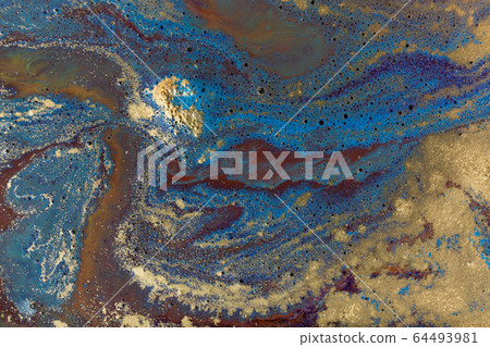 Blue mixed inks paint with golden powder background. Blue mixed inks paint with golden powder background. 64493981