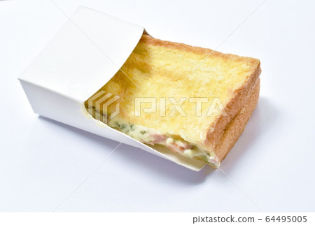 French toast sandwich stuffed bacon and cheese in paper packing on white background French toast sandwich stuffed bacon and cheese in paper packing on white background 64495005