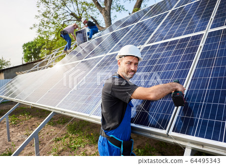 Stand-alone exterior solar panel system installation, renewable green energy generation concept. 64495343
