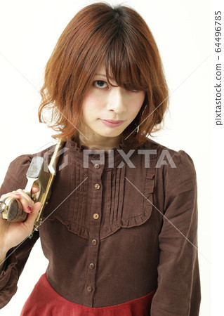 A woman with a gun A woman with a gun 64496785